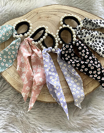 Pearl tie with floral print scarf