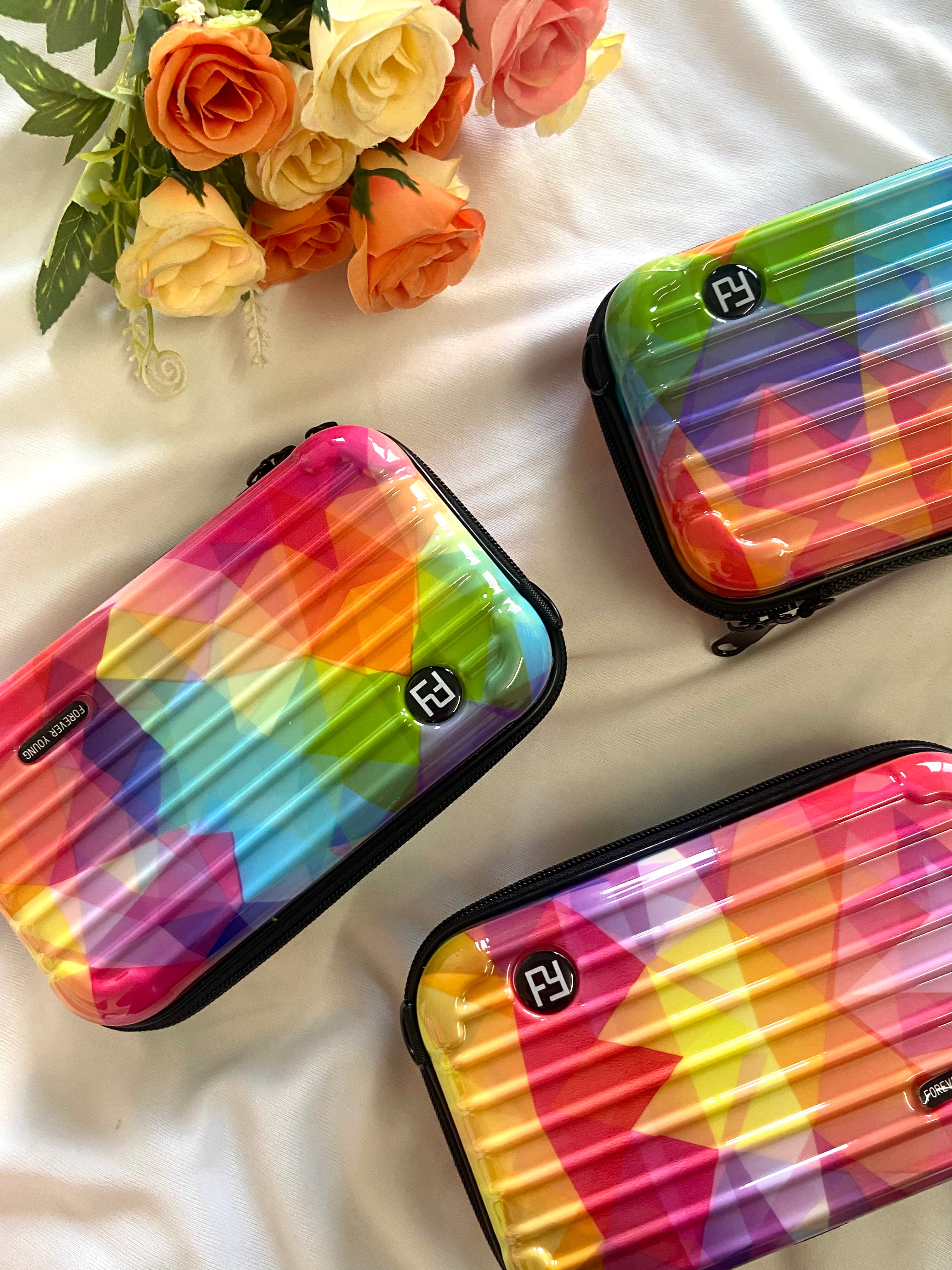 Multicoloured hard case sling bags