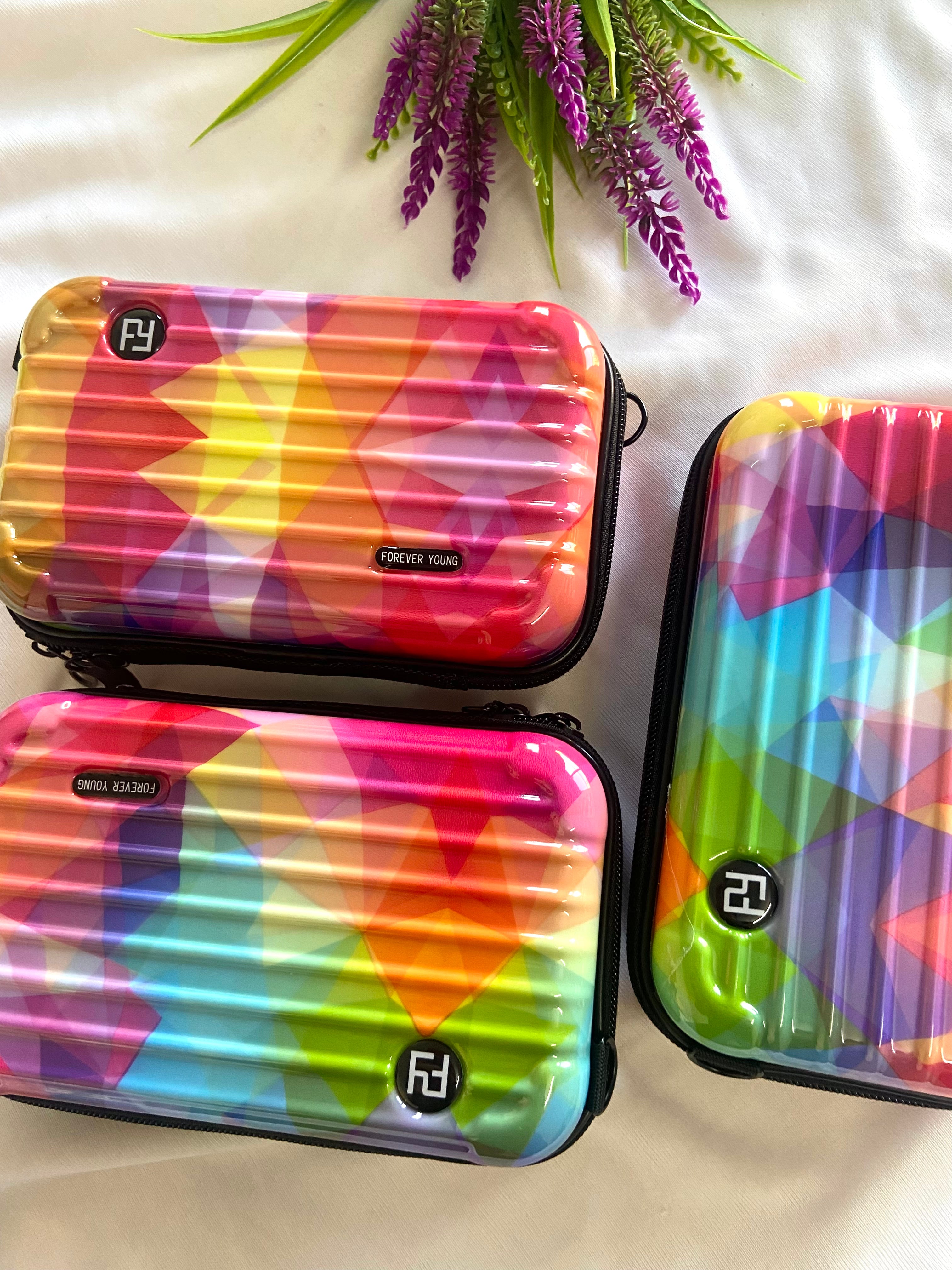 Multicoloured hard case sling bags